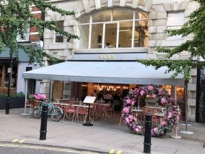 View of Elan Cafe's awning from across the street