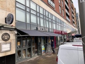 Grey restaurant awnings side view