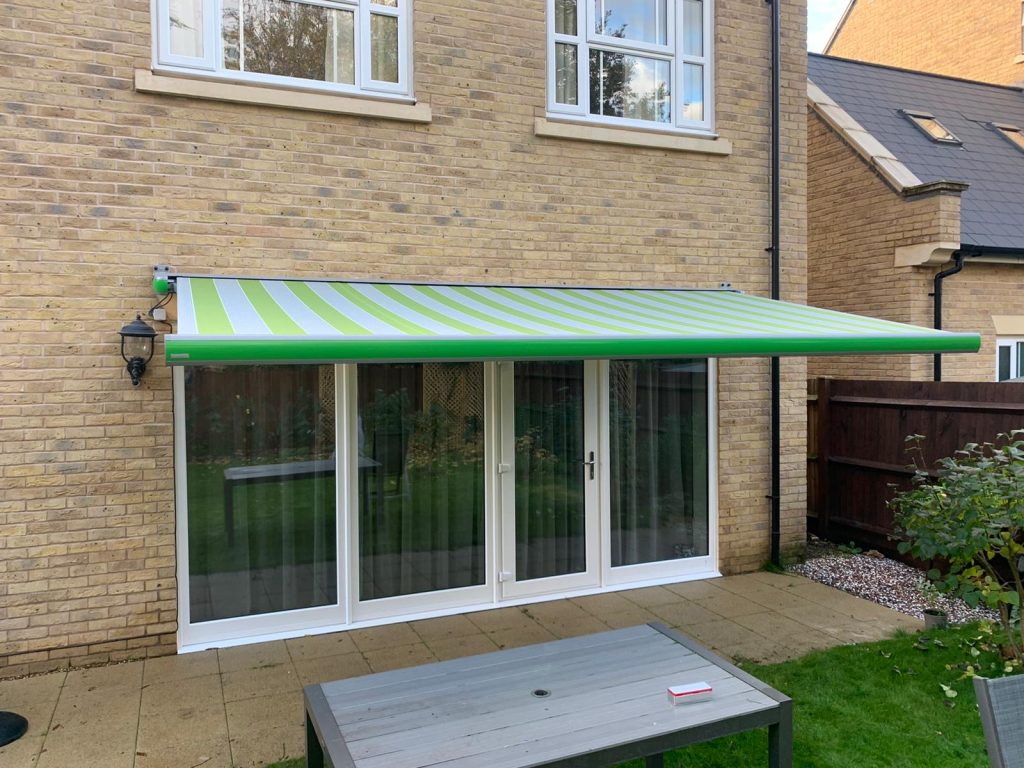 Light green and white stripe patio awning