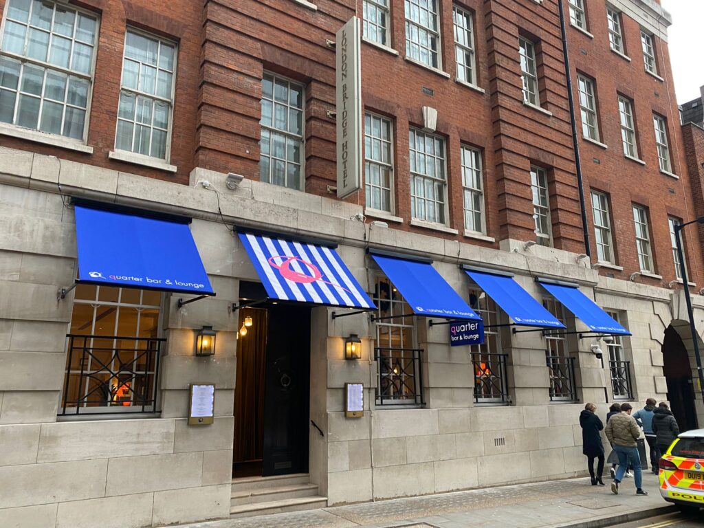 Blue and white striped awnings of hotel