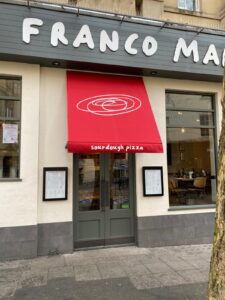 Red entrance awning of restaurant