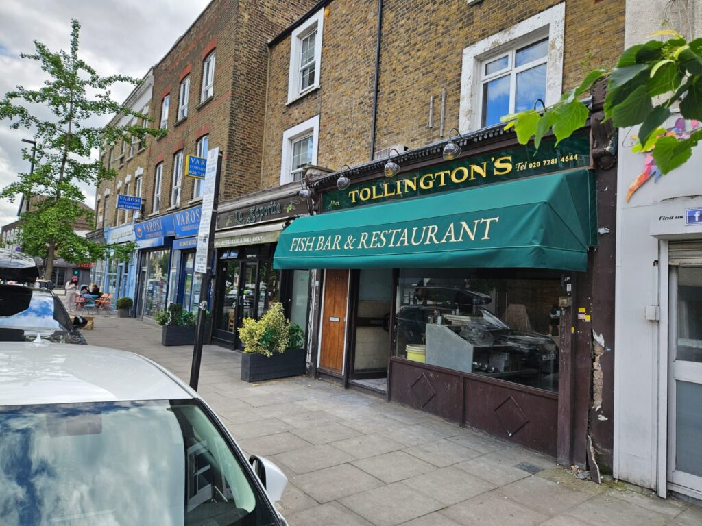 Green Dutch canopy of restaurant near left view